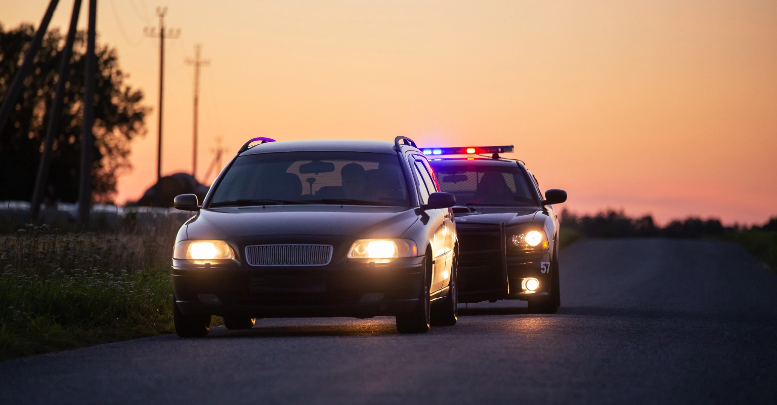 Police vehicle pulled over on a roadside stop