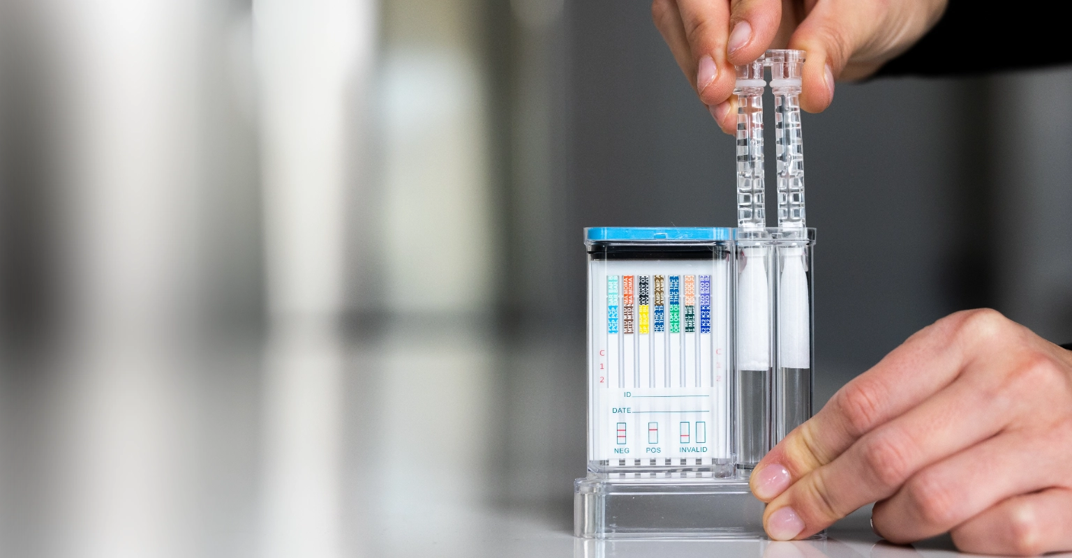 Infographic showing the post-accident oral fluid drug testing workflow using EZ Saliva II